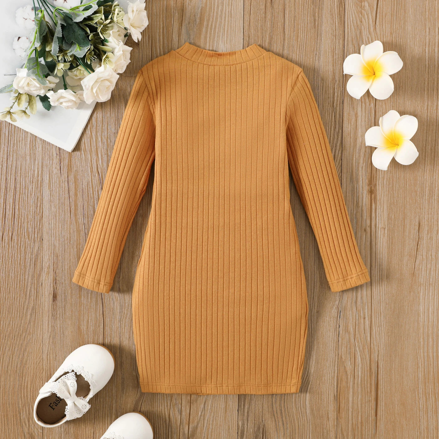 Kuschelweiches Strickkleid für kleine Trendsetter