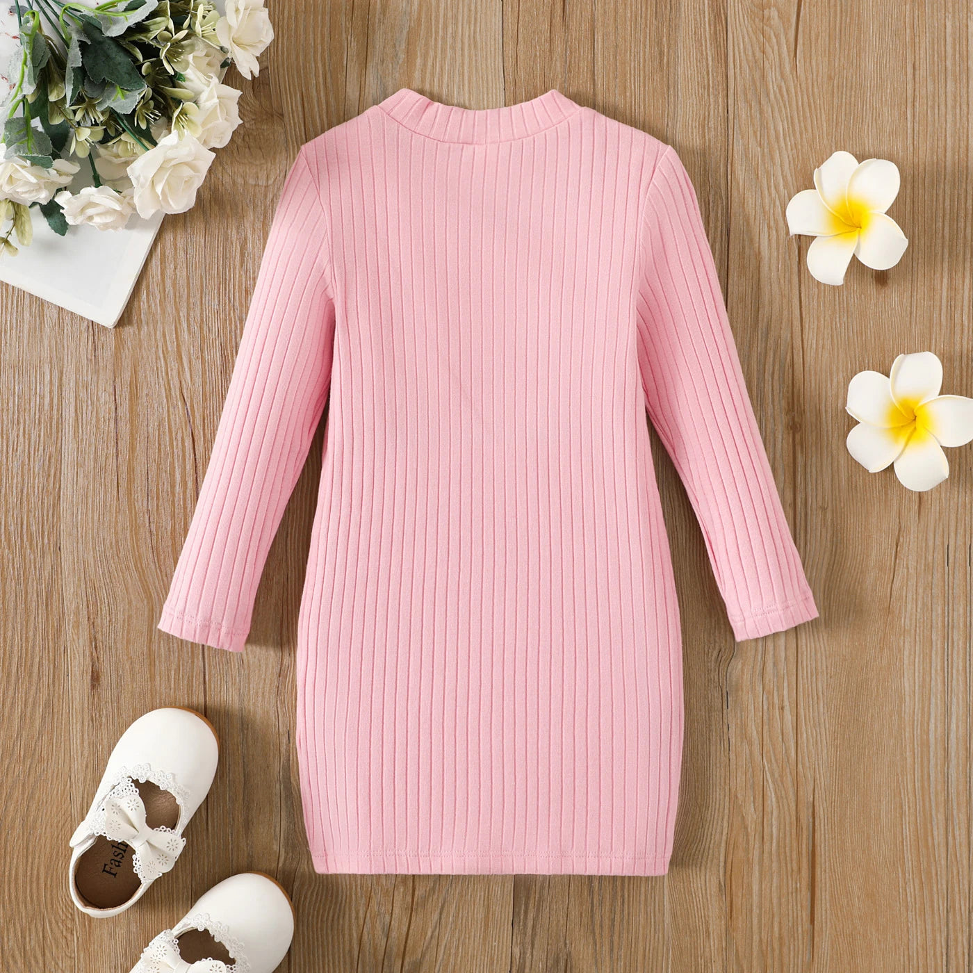 Kuschelweiches Strickkleid für kleine Trendsetter