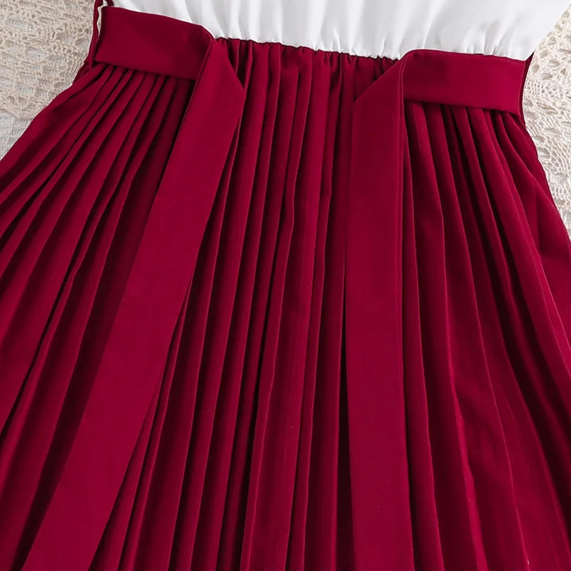 Elegantes Mädchenkleid mit Plisseerock