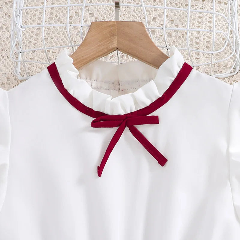 Elegantes Mädchenkleid mit Plisseerock
