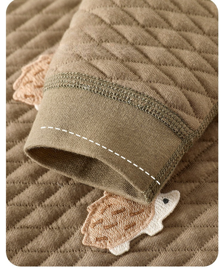 Gesteppter Baby-Strampler aus 100 % Baumwolle – warm & zeitlos
