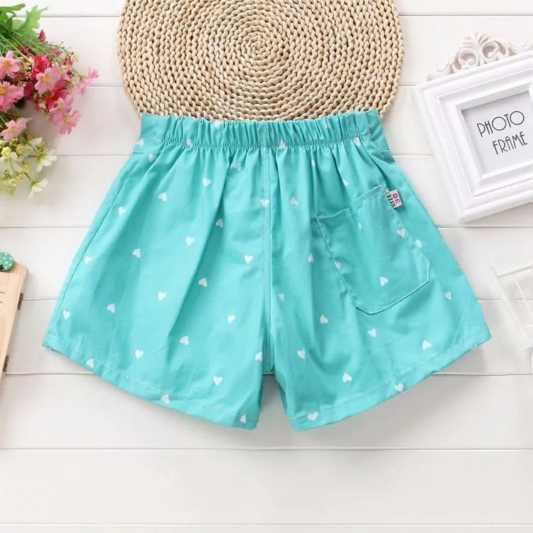 Zauberhafte Mädchen-Shorts mit Herzmuster und Schleifendetail