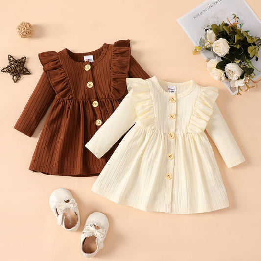 Baby-Kleid mit Rüschen und Knöpfen