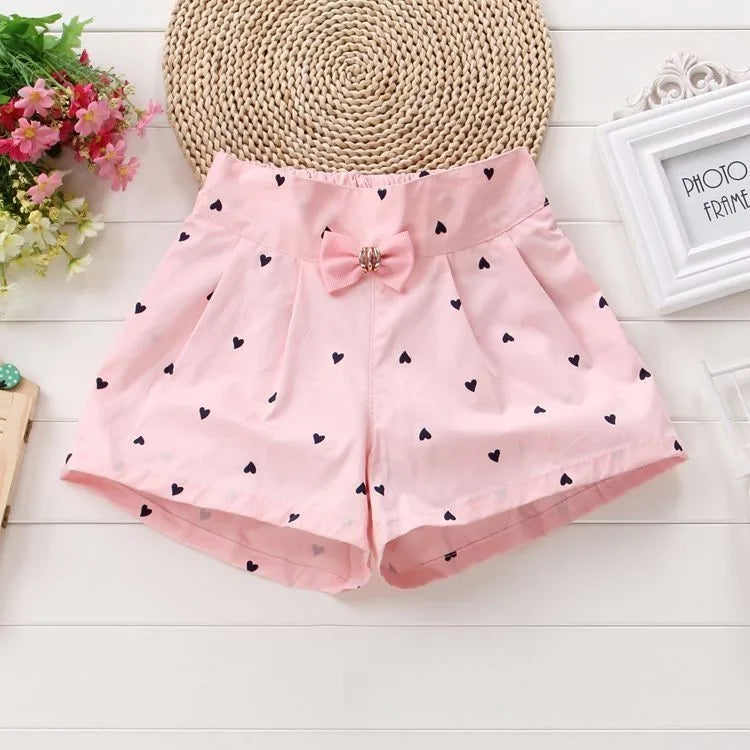Zauberhafte Mädchen-Shorts mit Herzmuster und Schleifendetail