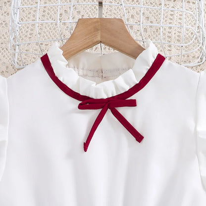 Elegantes Mädchenkleid mit Plisseerock