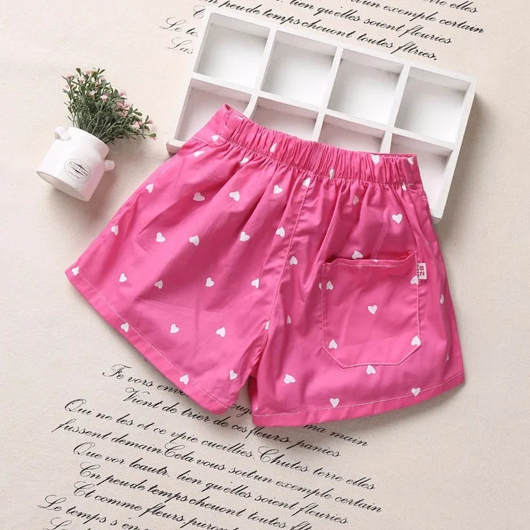 Zauberhafte Mädchen-Shorts mit Herzmuster und Schleifendetail