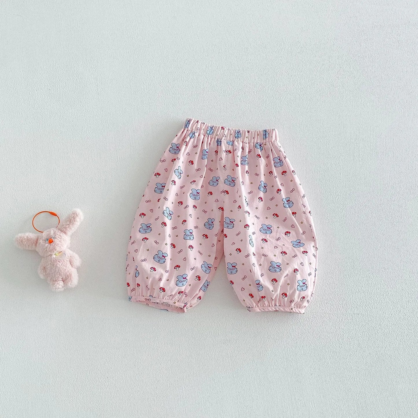 Mädchen Pumphose aus Baumwolle – Locker geschnittene Kinderhose mit süßen Prints