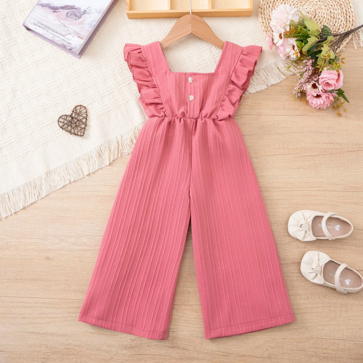 Mädchen Jumpsuit mit Schleife & Rüschen – verspielt & bequem zugleich