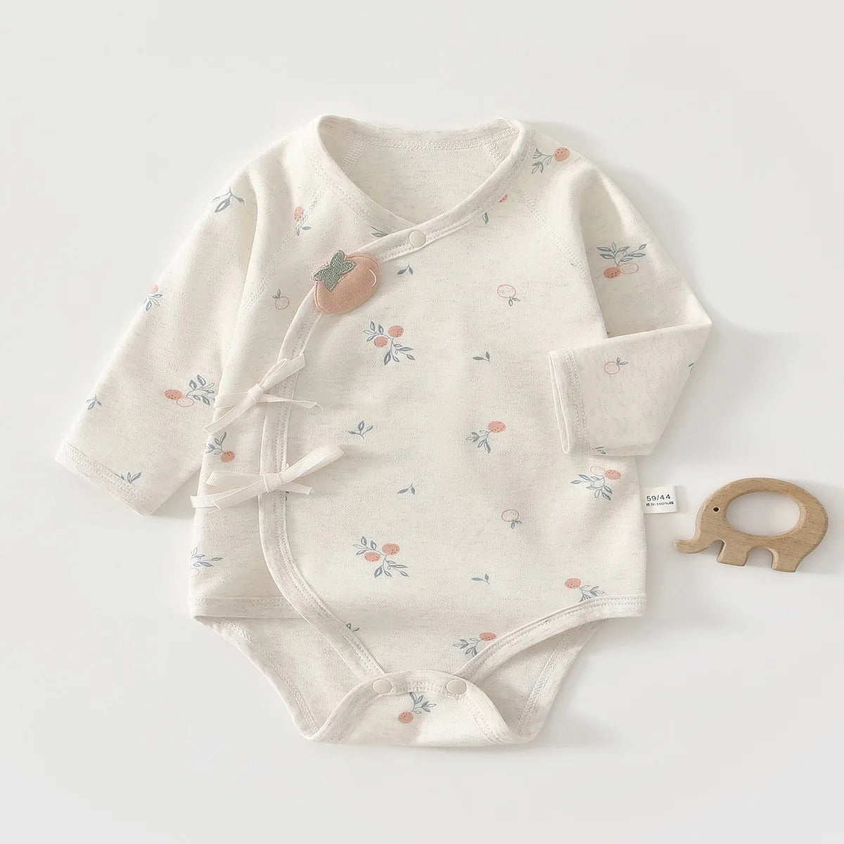 Wickelbody für Babys – weicher Langarm Babybody mit liebevollen Illustrationen